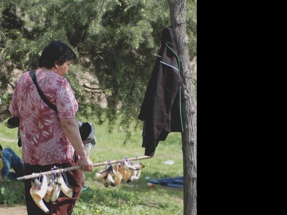 Vendedora de cachos para tomar chicha